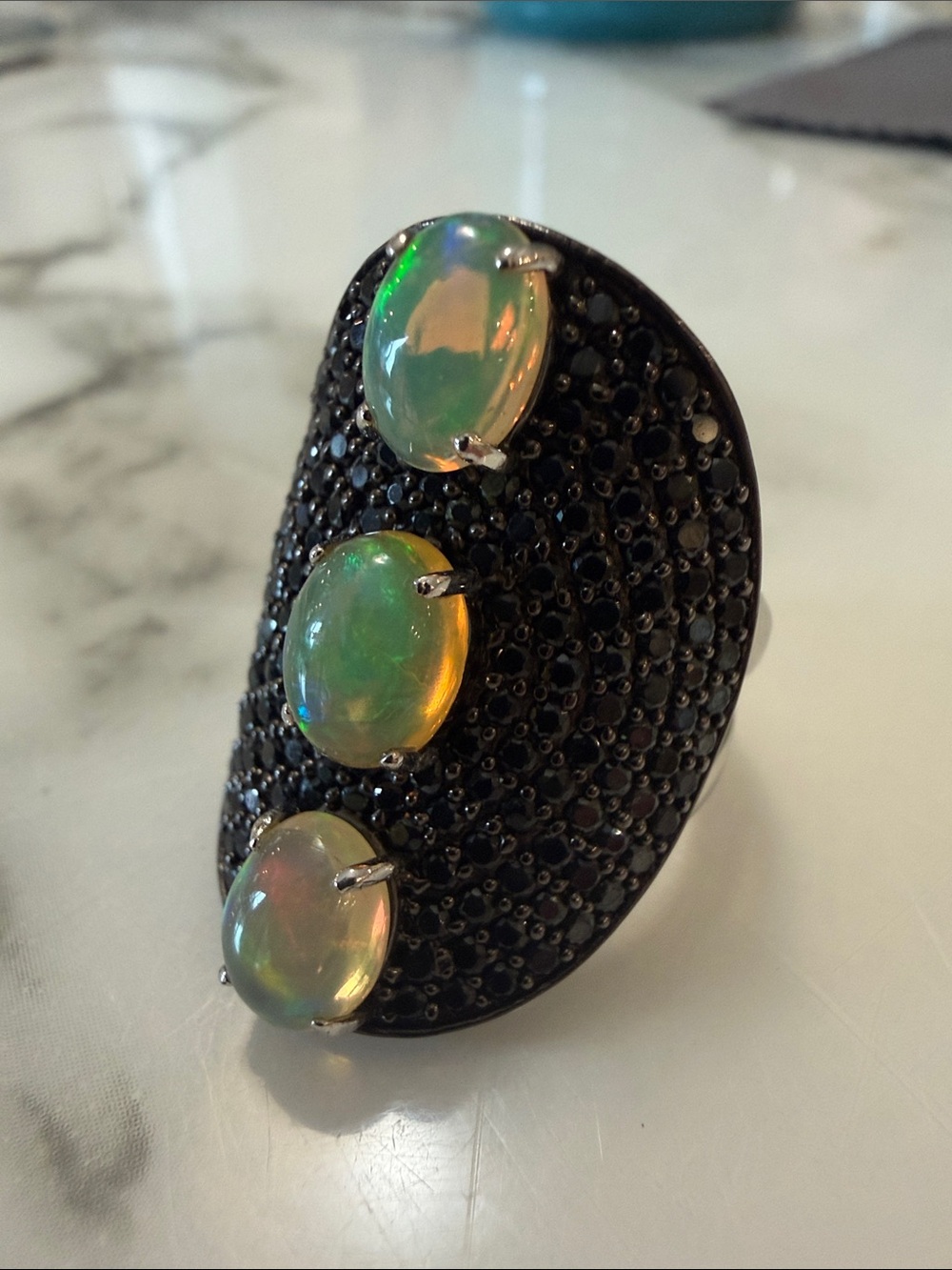 Carol Brodie silver ring with black spinels and opals, size 6.5-7